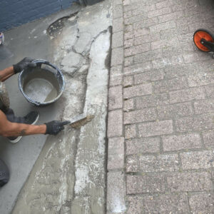 autogarage-betonvloer-scheuren-gaten